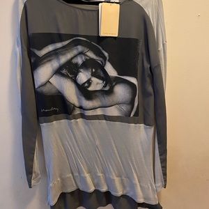 Woman’s shirt never worn tags are still on. Black and gray